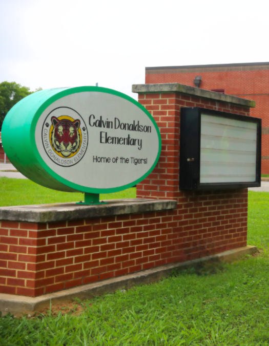 school name sign entrance Calvin Donaldson Elementary