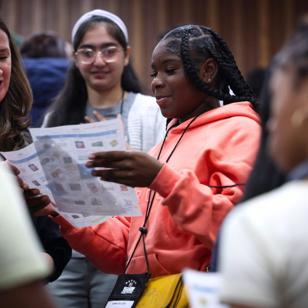 2_c38fe5 A student reads a worksheet