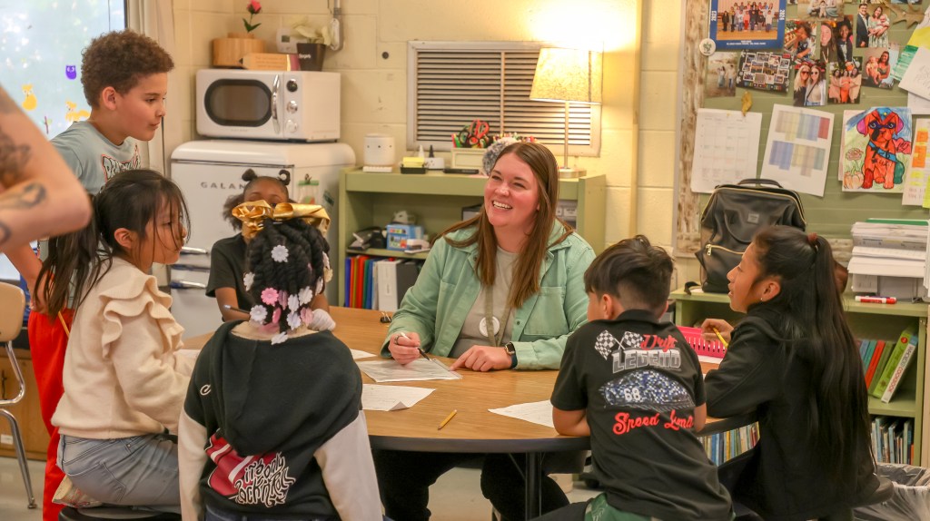 CHE Mentor Highlight-14 teacher with student