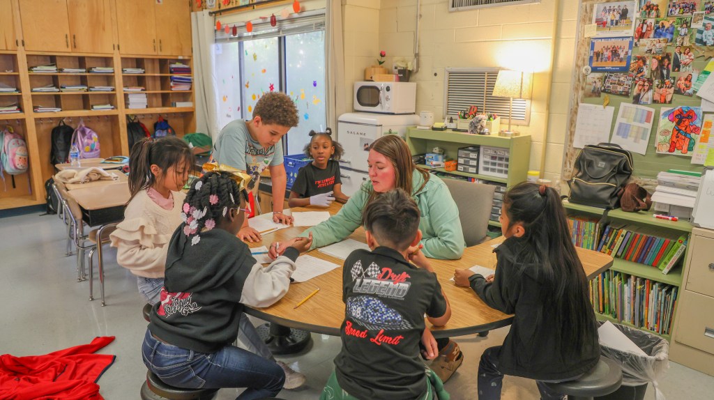 CHE Mentor Highlight-15 teacher with student