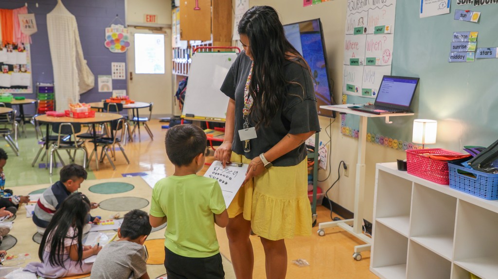 CHE Mentor Highlight-3 teacher with student