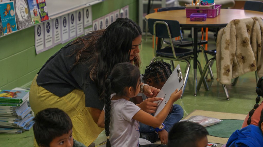 CHE Mentor Highlight-6 teacher with student